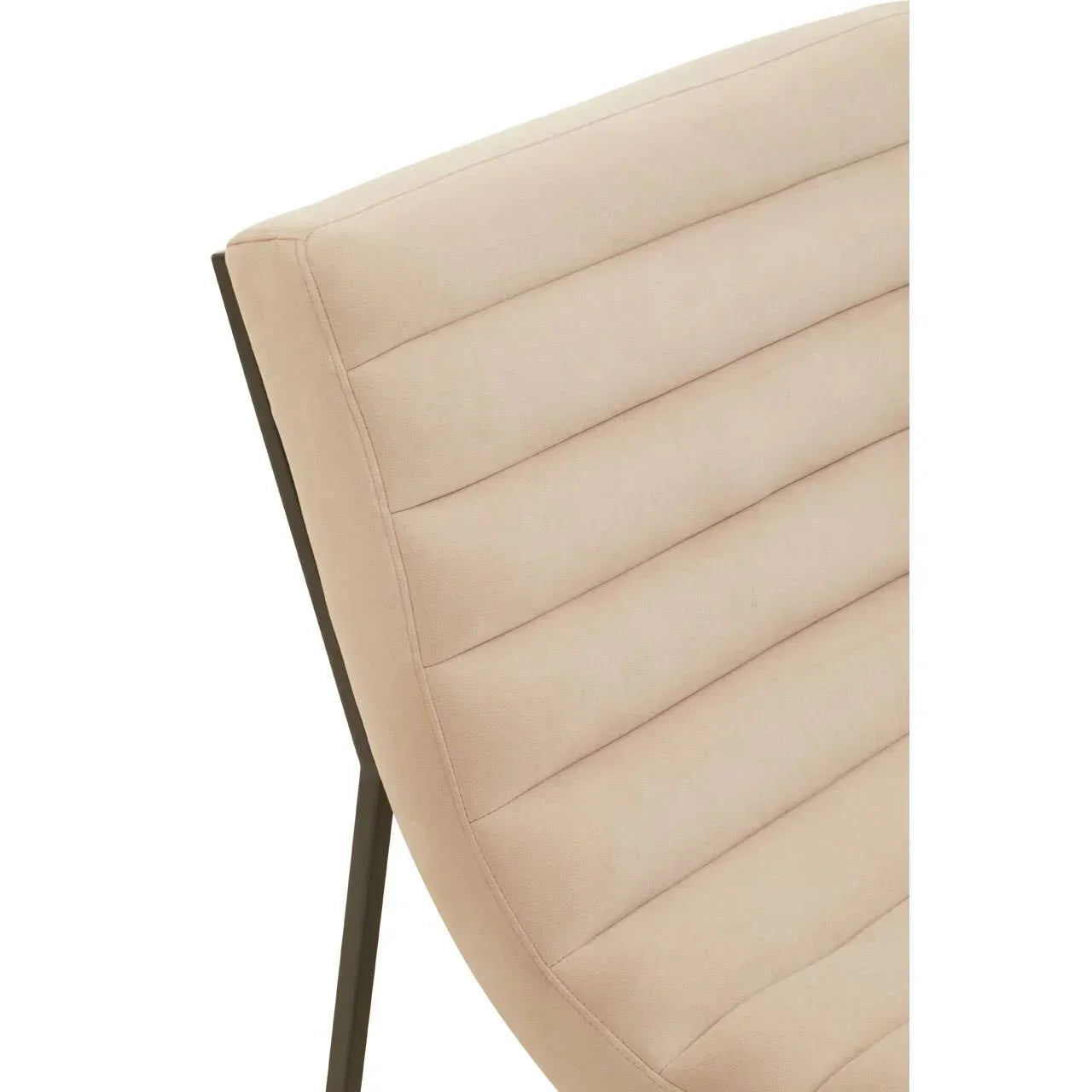 Close-up of beige upholstered dining chair with horizontal stitching and metal legs