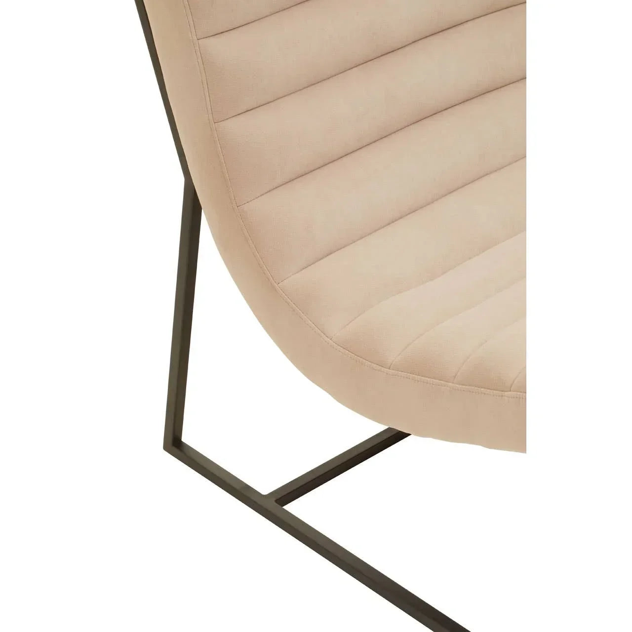 Close detail of beige fabric accent chair with black metal frame and horizontal stitching