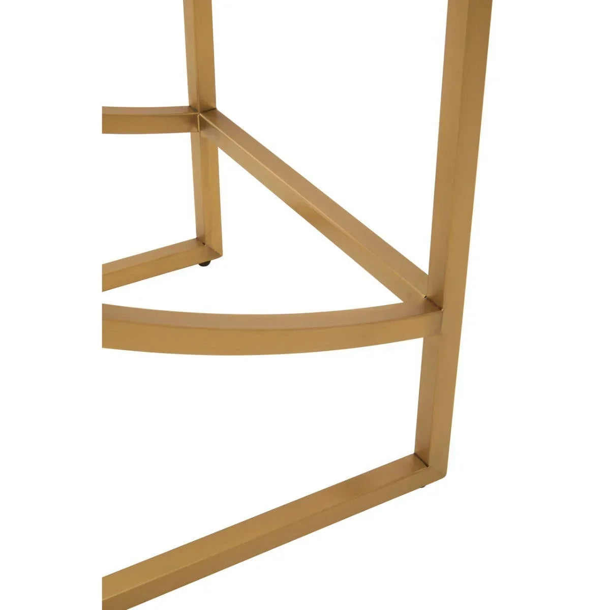 Gold metal table legs with geometric frame detail, close-up of modern furniture base
