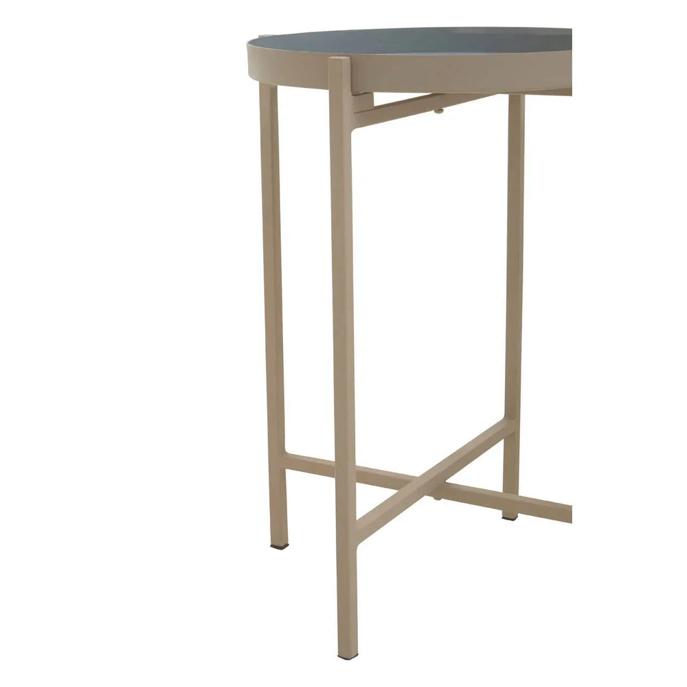 Round side table with beige metal frame and dark tabletop, partial side angle view