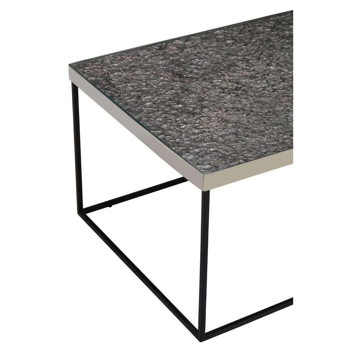 Modern coffee table with textured grey glass top and black metal frame, corner view