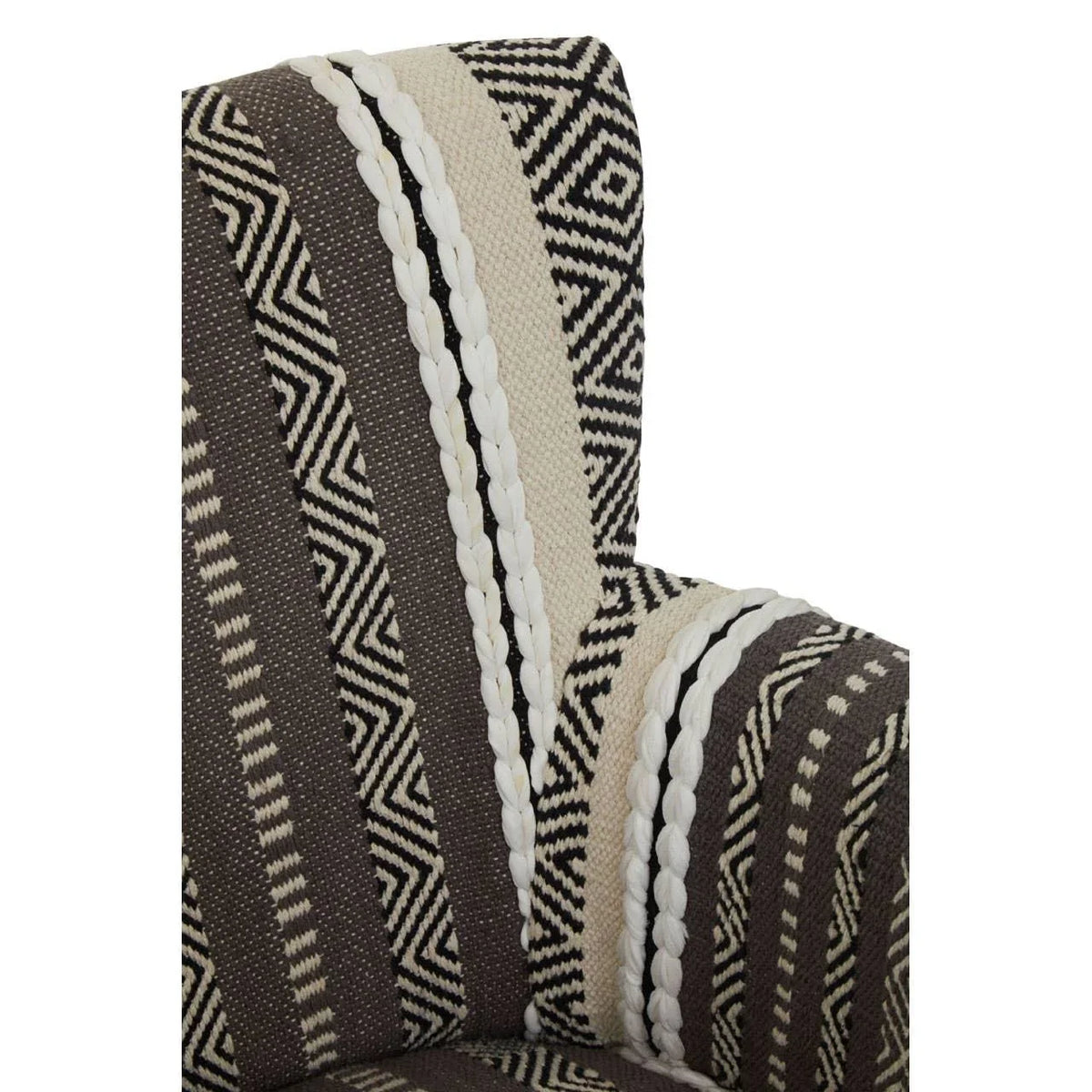 Patterned armchair upholstery with black, cream, and white geometric woven fabric