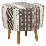 Round stool featuring a grey and white patterned fabric with geometric designs, supported by four wooden legs. The stool has a soft, textured appearance, making it suitable for various home decor styles
