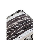 A grey and white pouffe featuring a geometric pattern with alternating stripes and decorative motifs, designed for home furniture use