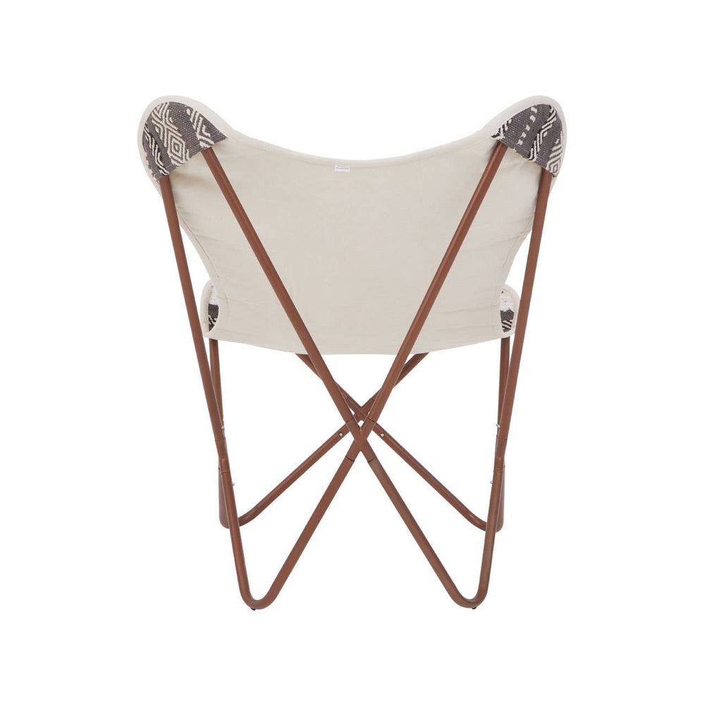 A grey and white butterfly chair featuring a cream-colored fabric seat supported by a sleek, brown metal frame with crossed legs. The chair has a minimalist design, showcasing a modern aesthetic suitable for various home decor styles