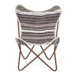 A butterfly chair featuring a grey and white striped fabric seat with a soft texture, supported by a sturdy brown metal frame that forms a cross design at the base. The chair's unique shape and colors make it a stylish addition to any home decor