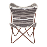 A butterfly chair featuring a grey and white striped fabric seat with a soft texture, supported by a sturdy brown metal frame that forms a cross design at the base. The chair's unique shape and colors make it a stylish addition to any home decor