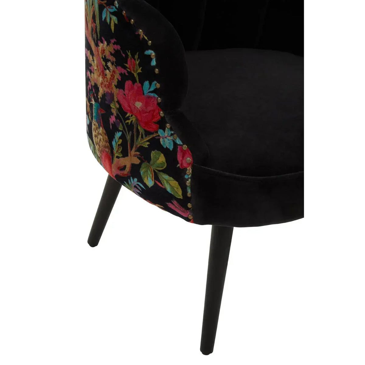 Black velvet accent chair with floral embroidered side and slender black legs