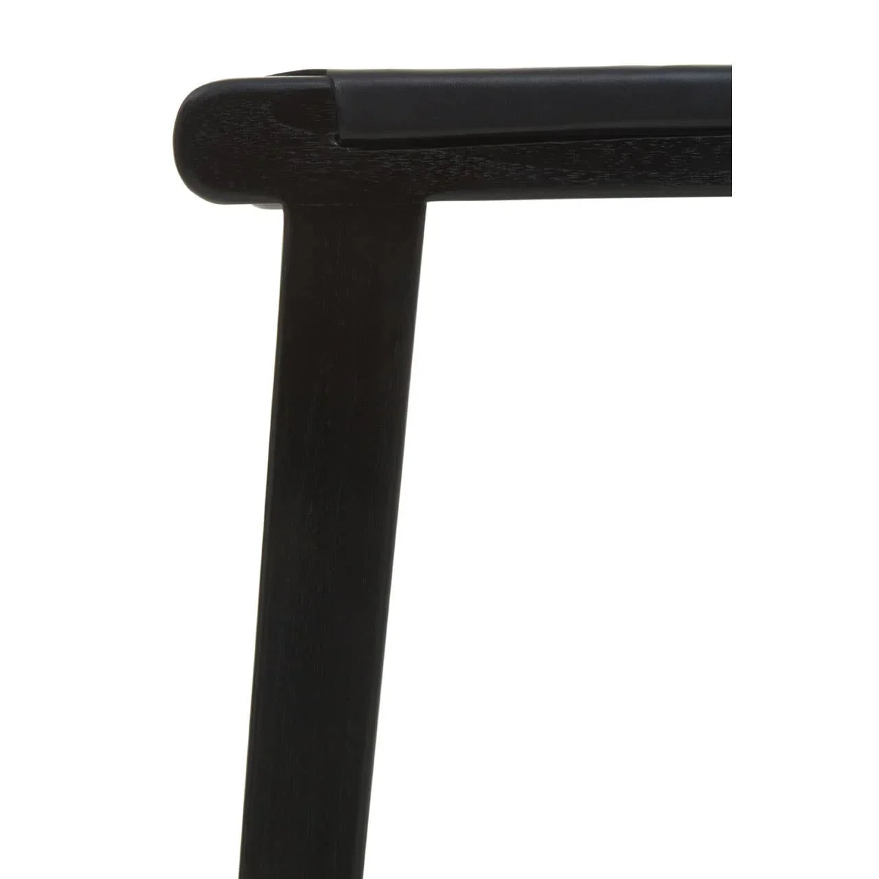 Close up of black wooden chair frame with smooth corner joint and upholstered seat edge