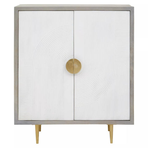 Cream and grey two-door cabinet made of mango wood, featuring a sleek design with a round gold handle and tapered legs. The cabinet has a smooth, light-colored front and a contrasting grey frame
