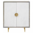 Cream and grey two-door cabinet made of mango wood, featuring a sleek design with a round gold handle and tapered legs. The cabinet has a smooth, light-colored front and a contrasting grey frame