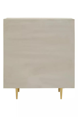 Cream and grey two-door cabinet made from mango wood, featuring a smooth surface and sleek design, supported by gold metal legs