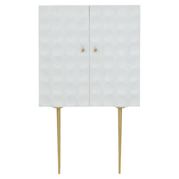Cream finish two-door cabinet made from mango wood, featuring a textured front with a geometric pattern, gold knobs, and slender gold legs for support