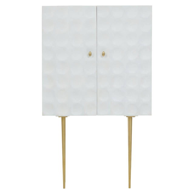 Cream finish two-door cabinet made from mango wood, featuring a textured front with a geometric pattern, gold knobs, and slender gold legs for support