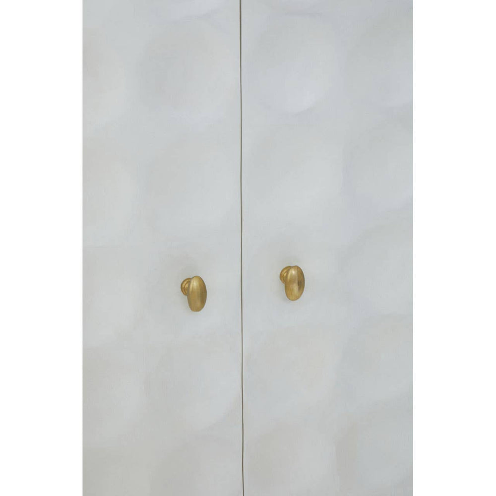 Cream finish two-door cabinet made from mango wood, featuring a textured geometric pattern on the doors and elegant gold handles