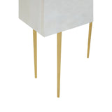 Cream-finished mango wood cabinet featuring two doors, sleek design, and four slender gold legs for an elegant touch