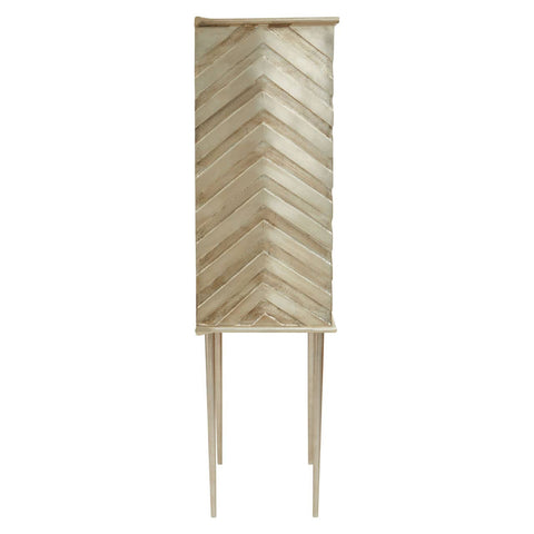 Tall, narrow cabinet with a chevron pattern on the front, featuring two doors and four slender legs. The cabinet has a light wood finish, giving it a modern and elegant appearance
