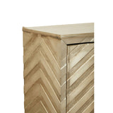 A close-up view of the Sirsa Two Door Cabinet featuring a light wood finish with a chevron pattern on the front. The cabinet has two doors with a sleek handle and a smooth top surface. The overall design is modern and stylish, suitable for home decor
