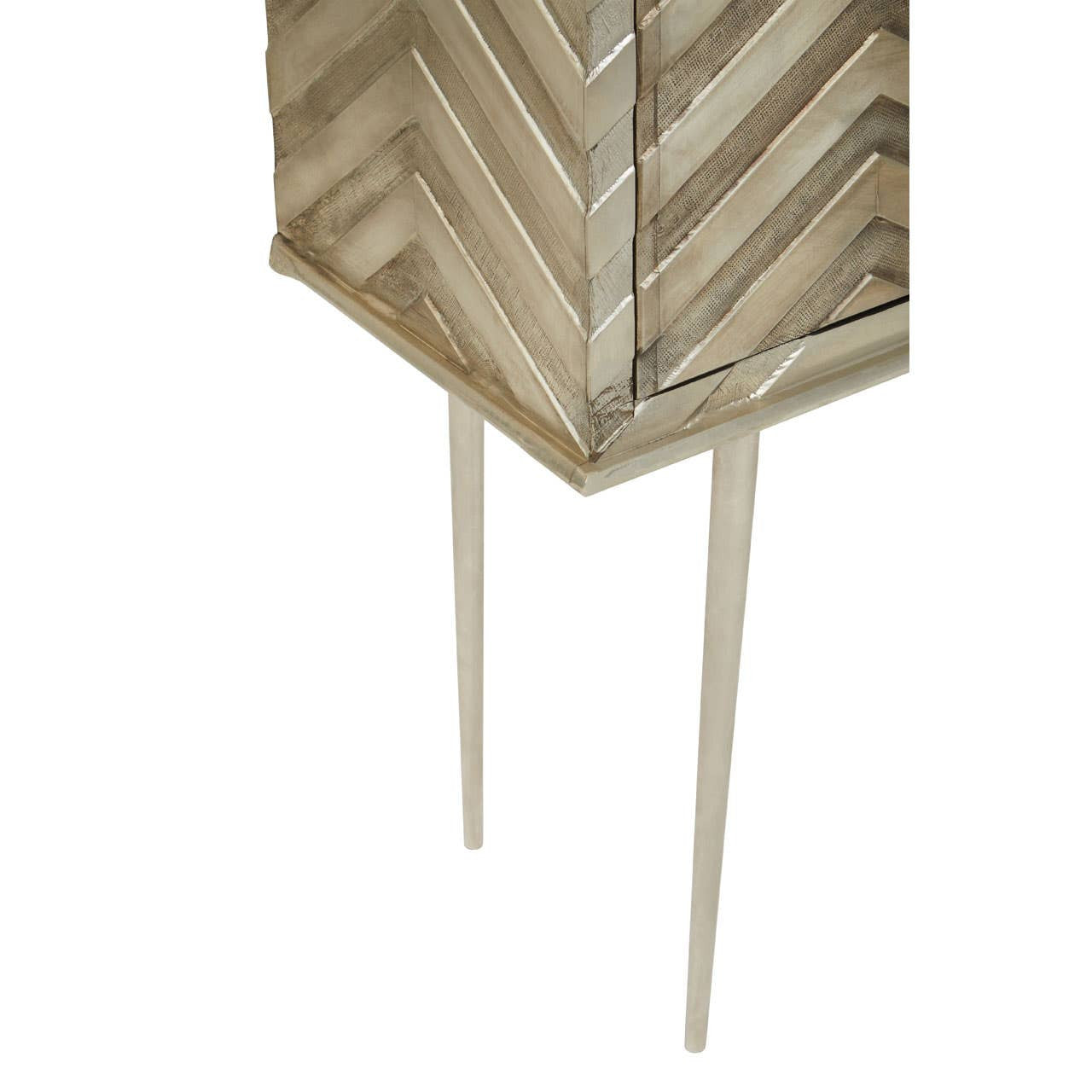 Two-door cabinet with a chevron pattern on the front, featuring a light wood finish and slender, tapered legs. The cabinet has a modern design suitable for home decor