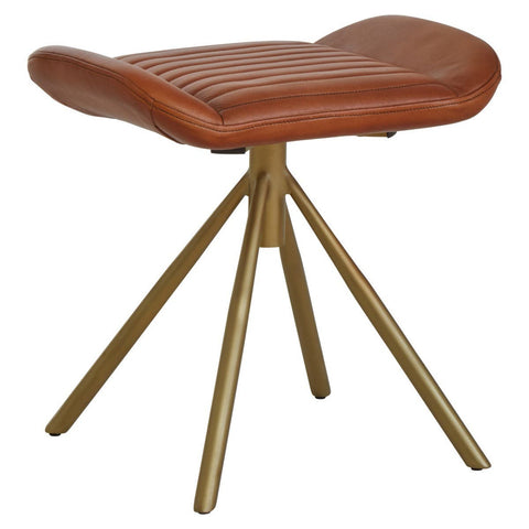 Buffalo tan leather footstool with a curved, padded seat and a sleek, gold-colored tripod base. The footstool features a smooth leather texture and a modern design, suitable for various home decor styles