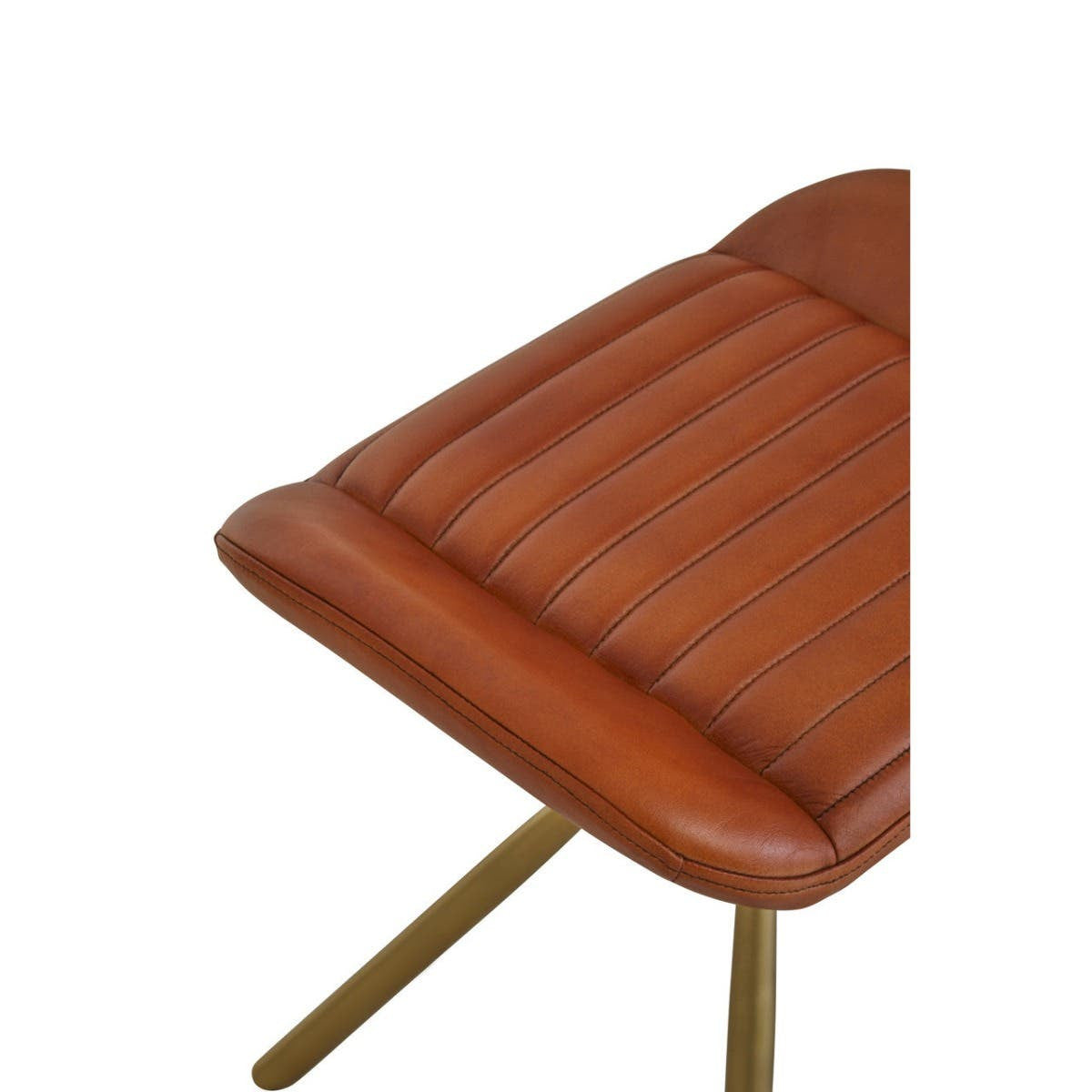 Buffalo tan leather footstool with a ribbed design on the seat and slender gold metal legs. The footstool features a smooth, warm-toned leather surface that adds a touch of elegance to any space
