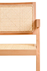 Closeup of natural wood dining chair with rattan seat and cane backrest