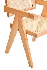 Natural wood dining chair with woven cane seat and back, close-up of angled leg design