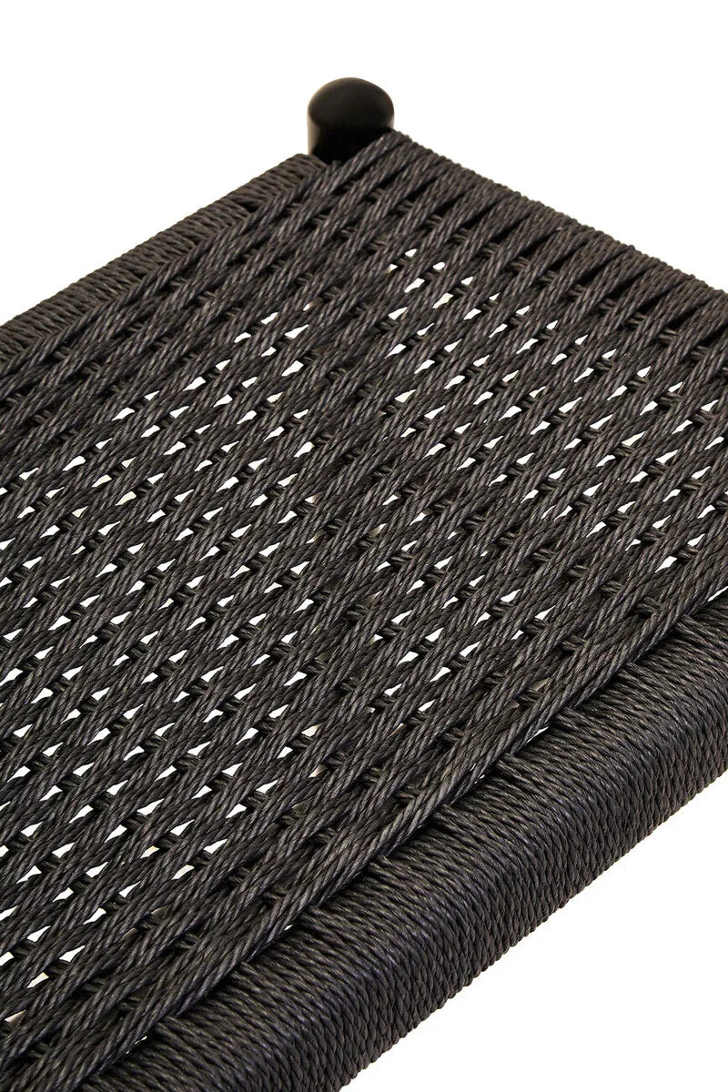 Closeup of black woven rattan outdoor furniture seat with durable rope detailing