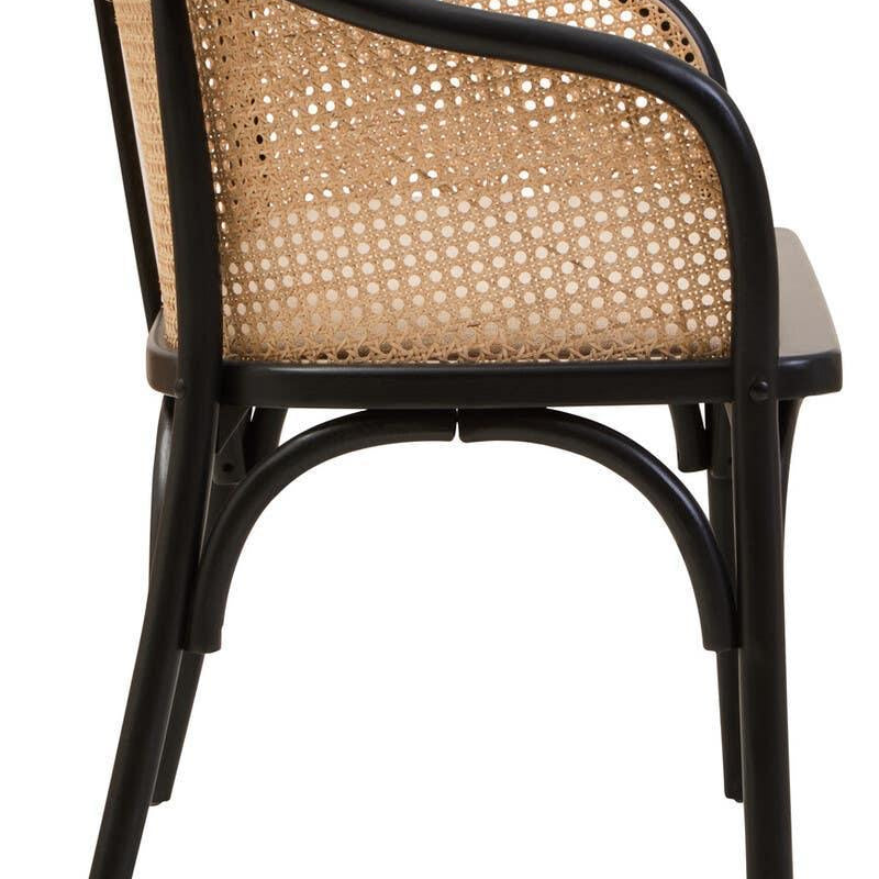 Black frame rattan dining chair with curved backrest and woven cane panel