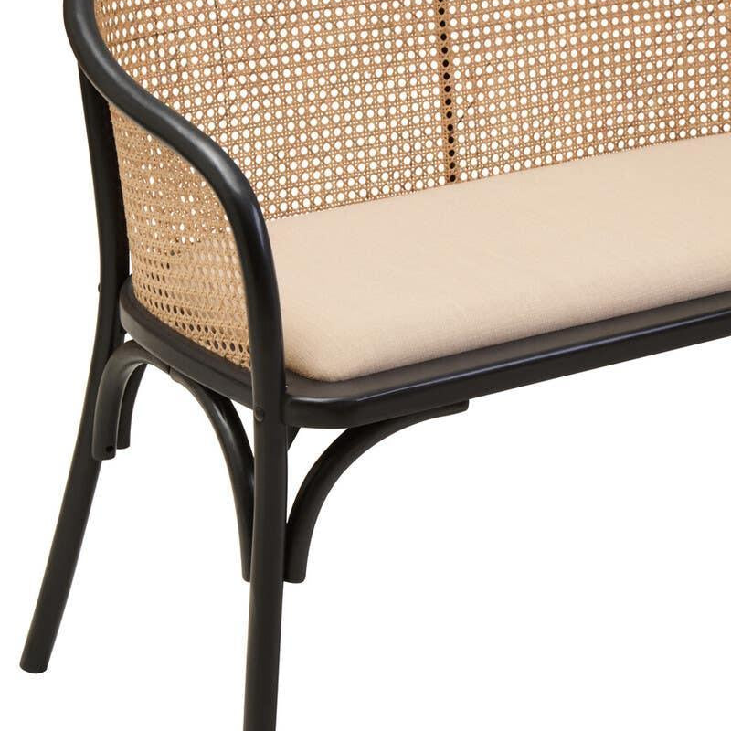 Rattan bench with black frame and beige cushion, close view of seat and curved backrest