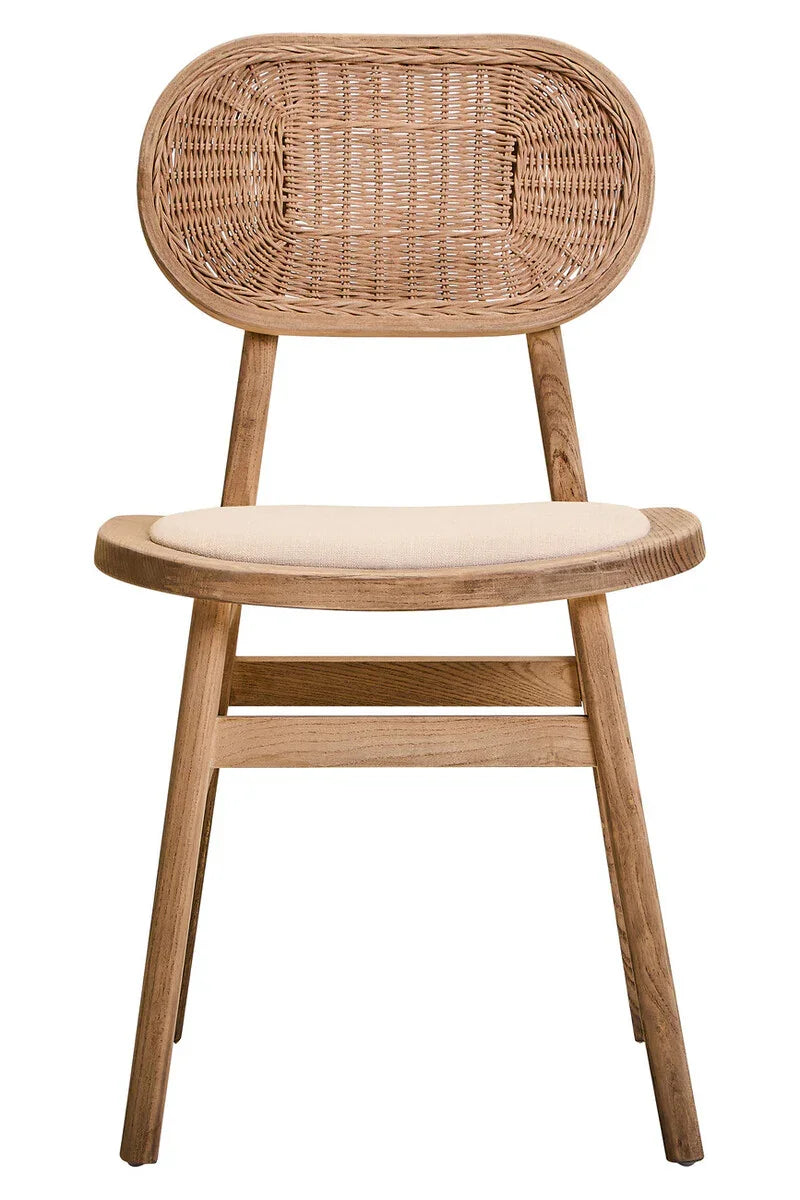 Natural wood dining chair with woven rattan backrest and cushioned seat, front view