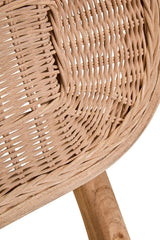 Closeup of natural rattan chair backrest with woven pattern and wooden frame detail