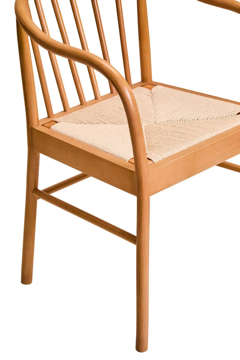 Solid wood dining chair with curved spindle back and woven seat detail