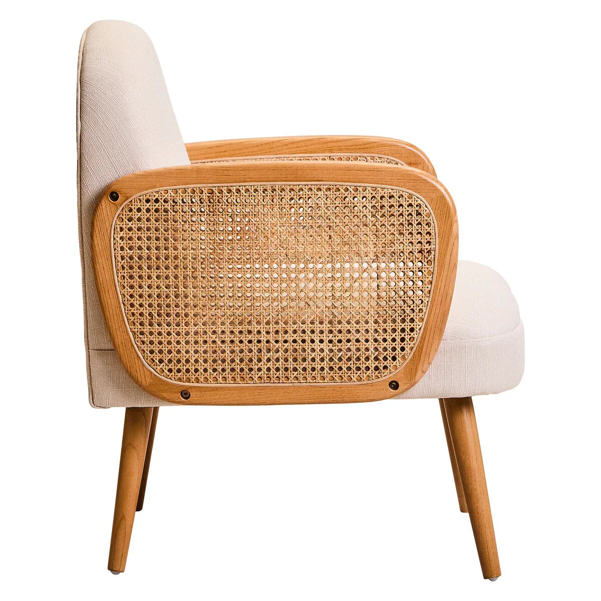 Side view of accent chair with cane panel wooden armrest and light fabric upholstery