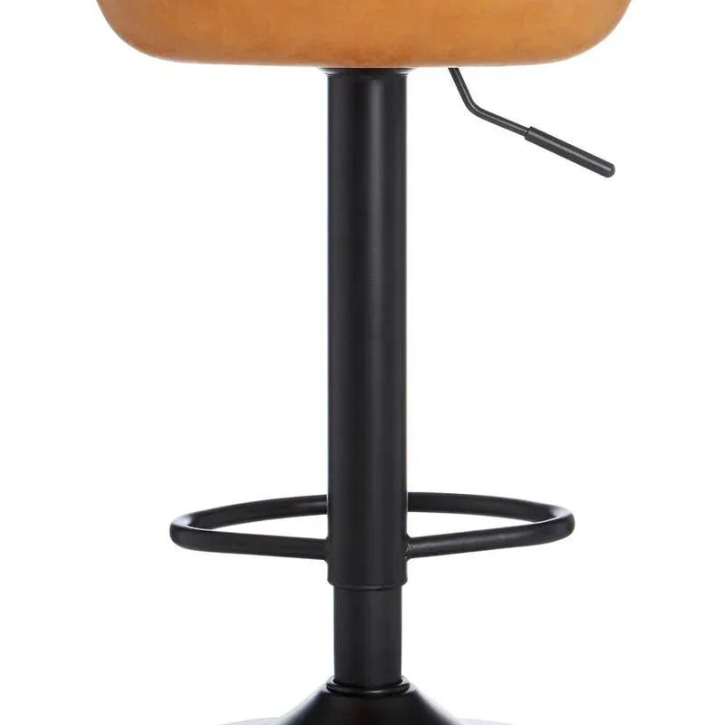 Tan bar stool with black metal base and footrest, rear view showing seat and lever