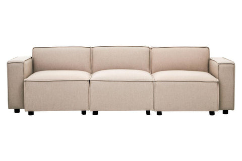 Armless modular sofa with a natural fabric upholstery in a light beige color, featuring three cushioned sections and a sleek design, supported by small black wheels for easy mobility