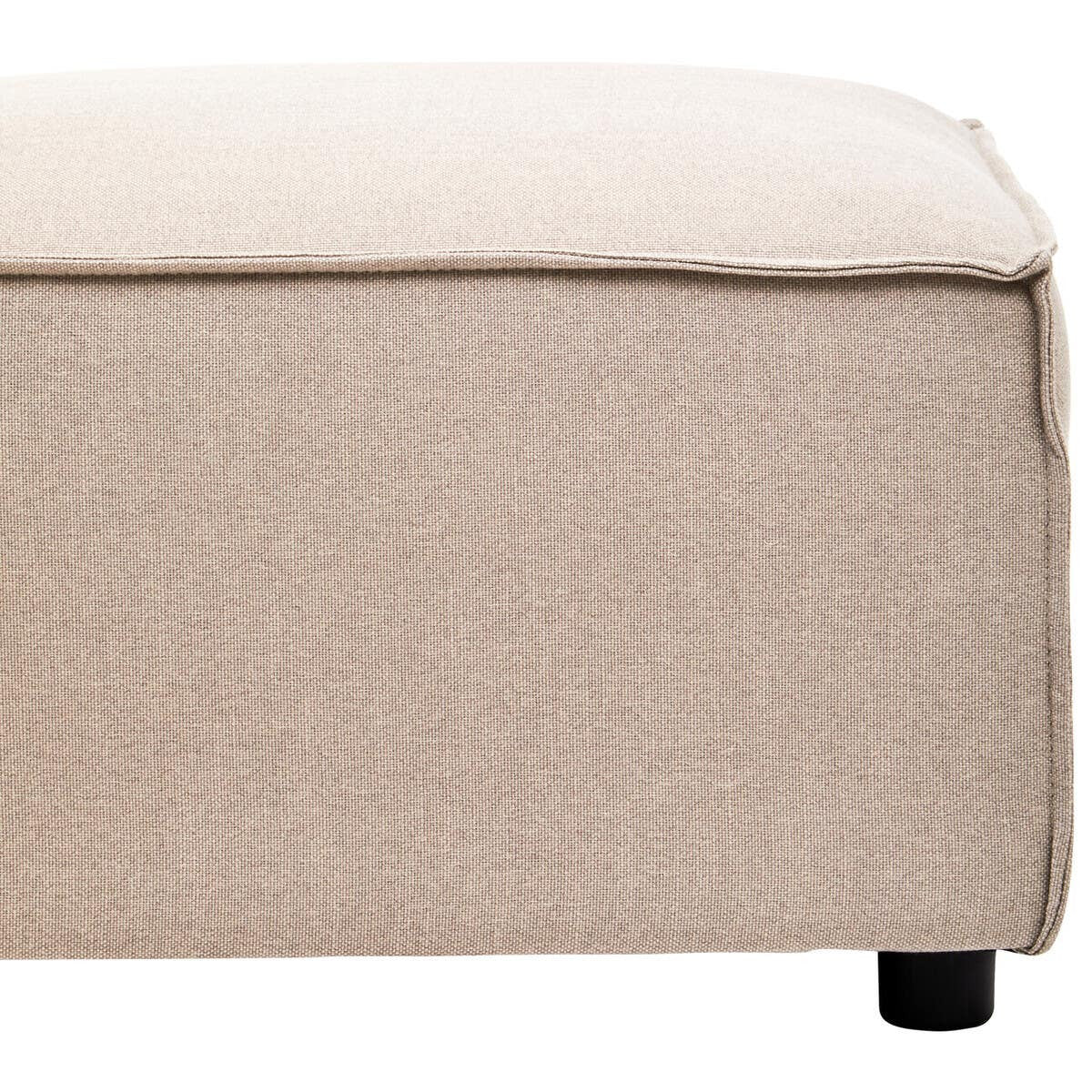 Natural fabric modular ottoman in a light beige color, featuring a clean, minimalist design with a soft, textured surface and rounded edges. The ottoman rests on small, dark wooden legs, providing stability and a modern touch