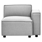 Grey fabric modular sofa with a right armrest, featuring a plush seat cushion and a tall backrest. The sofa has a minimalist design with clean lines and is supported by short, rounded black legs