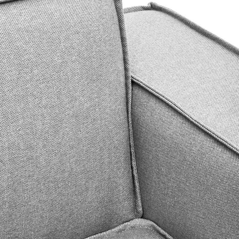 Close-up view of the Toulouse Grey Fabric Right Arm Modular Sofa, showcasing the soft grey upholstery, clean lines, and contrasting piping along the edges of the armrest and cushion