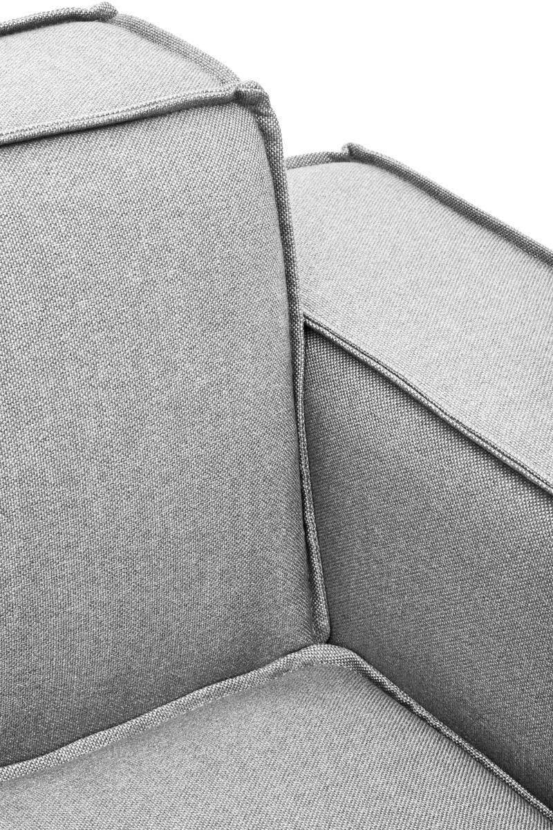 Close-up view of the Toulouse Grey Fabric Right Arm Modular Sofa, showcasing the soft grey upholstery, clean lines, and contrasting piping along the edges of the armrest and cushion