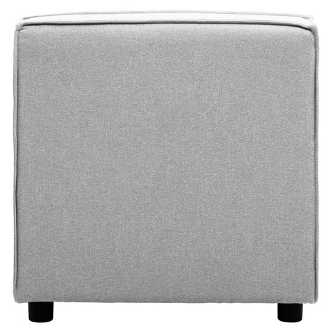 Armless modular sofa in a soft grey fabric with a clean, modern design, featuring a square shape and short black legs. The upholstery has a textured appearance, adding depth to the overall look