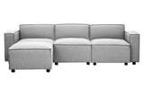 Grey fabric armless modular sofa featuring a contemporary design with clean lines, three cushioned sections, and a matching ottoman, all resting on small black wheels for easy mobility