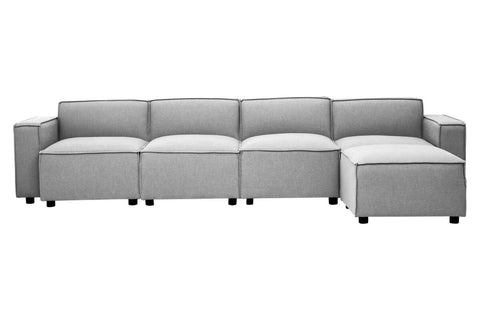 Grey fabric modular sofa with an armless design, featuring four connected sections and a chaise lounge on one end. The sofa has a clean, modern look with square edges and sits on small, dark legs