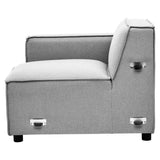 Left arm modular sofa upholstered in grey fabric, featuring a low backrest and a sleek, modern design. The sofa has a square shape with rounded edges, and it rests on short, sturdy legs. The side view highlights the armrest and the clean lines of the overall structure