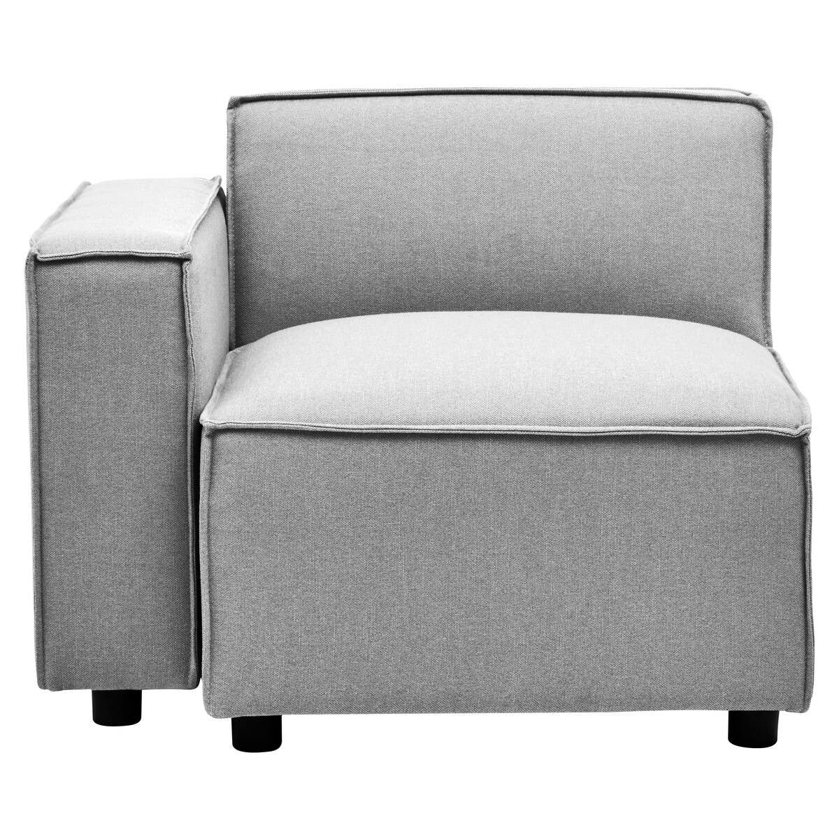 Left arm modular sofa in a soft grey fabric, featuring a minimalist design with a low back and a wide seat cushion. The armrest is square and slightly elevated, complemented by short, sturdy legs. The overall look is modern and versatile, suitable for various living spaces