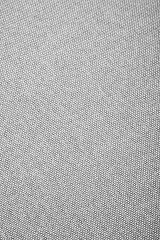 Close-up view of a textured grey fabric, showcasing a soft, woven pattern suitable for a modular ottoman