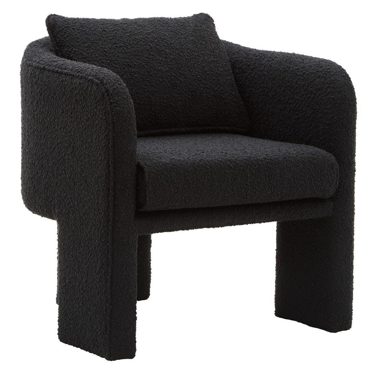 Black boucle accent chair with curved arms and cushion, shown at angle on white background