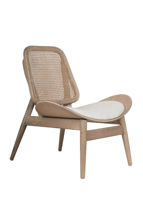 Beige fabric chair featuring a cane backrest and a washed elm wood frame, designed with a curved seat and angled legs for a modern aesthetic.