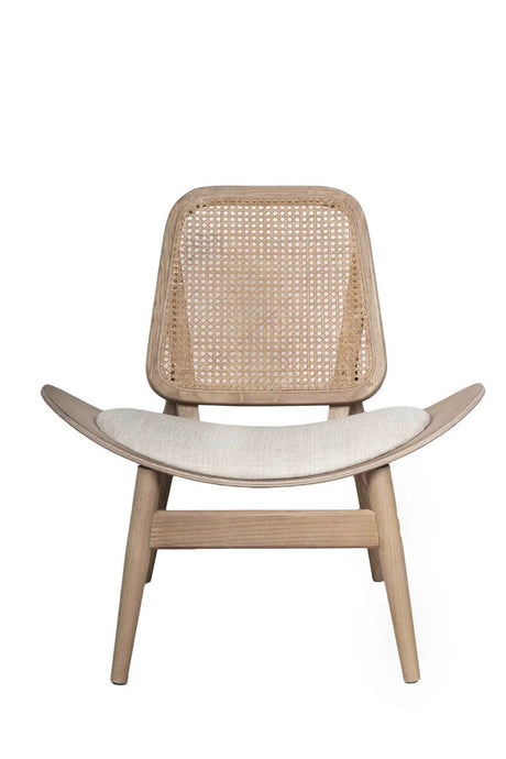 Beige fabric chair featuring a curved seat and a cane backrest, supported by natural washed elm wood legs.