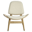 Beige fabric chair featuring a curved backrest and seat, supported by natural washed elm wood legs.
